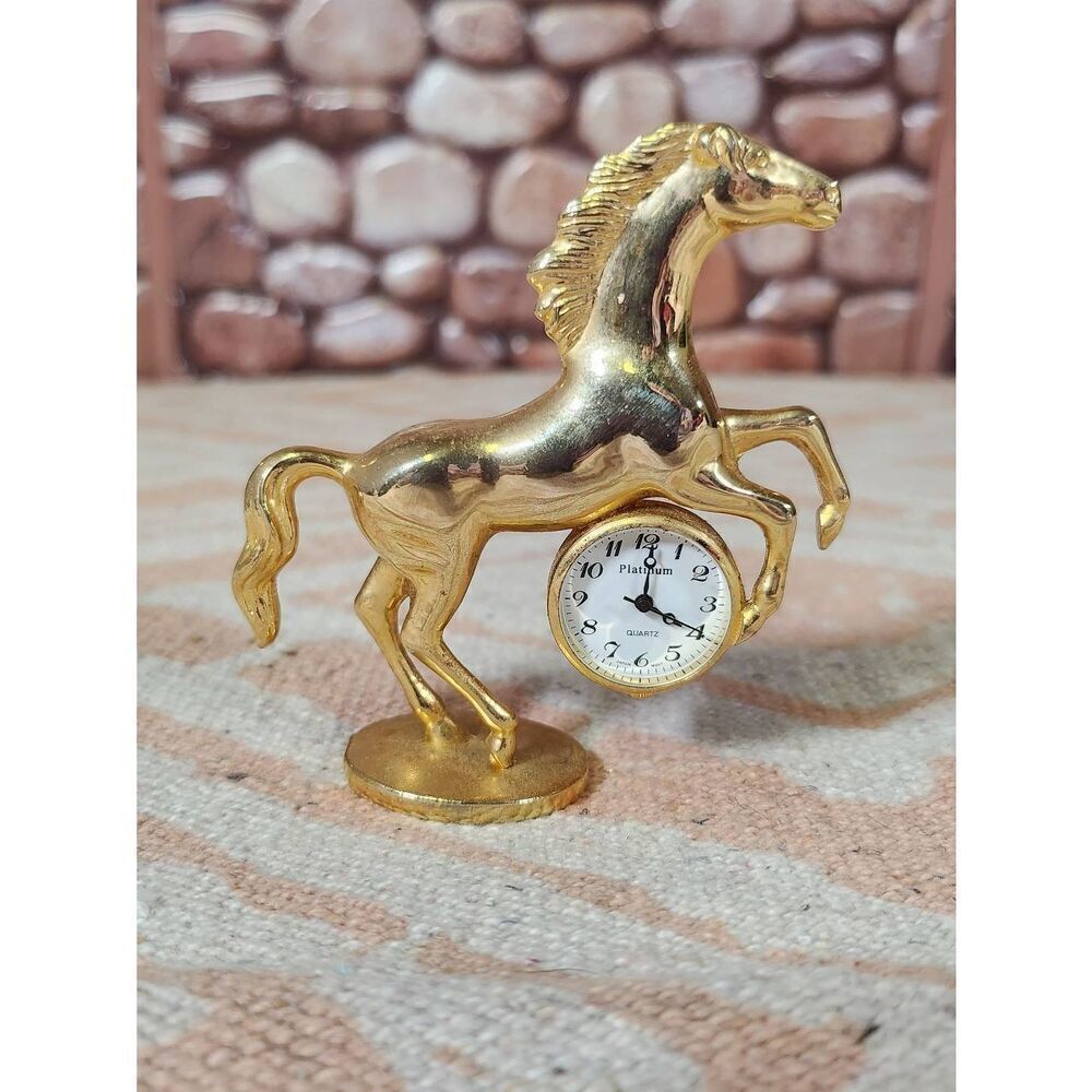 Miniature gold tone bucking horse clock